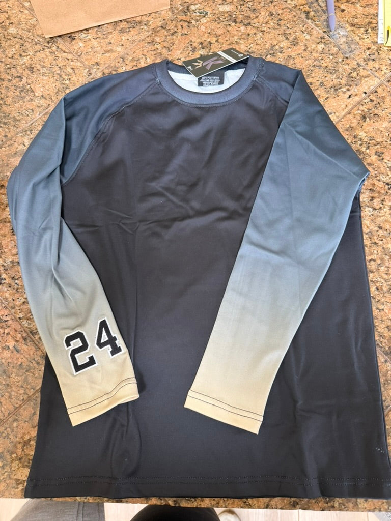 Charcoal long sleeve shirt with gray ombre sleeves and the number 24 on the cuff, laid flat.